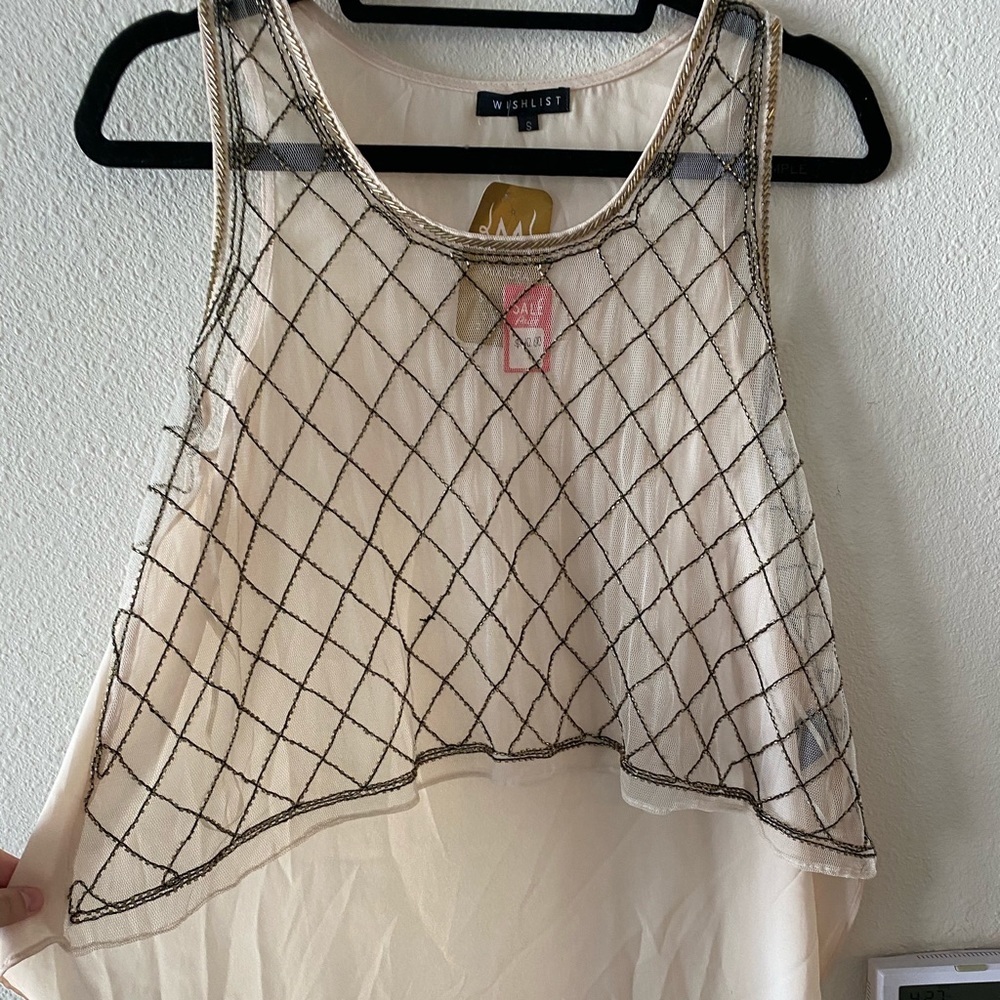 Transparent and beaded shirt